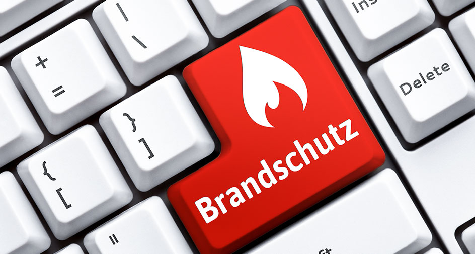 Teaserbild Brandschutz Teaserbild mit einem Foto einer Computertastatur und einer rot eingefärbten Taste mit der Aufschrift Brandschutz